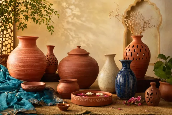 Indian clay pots, vases and terracotta vessels arranged in a home setting with care and use details.